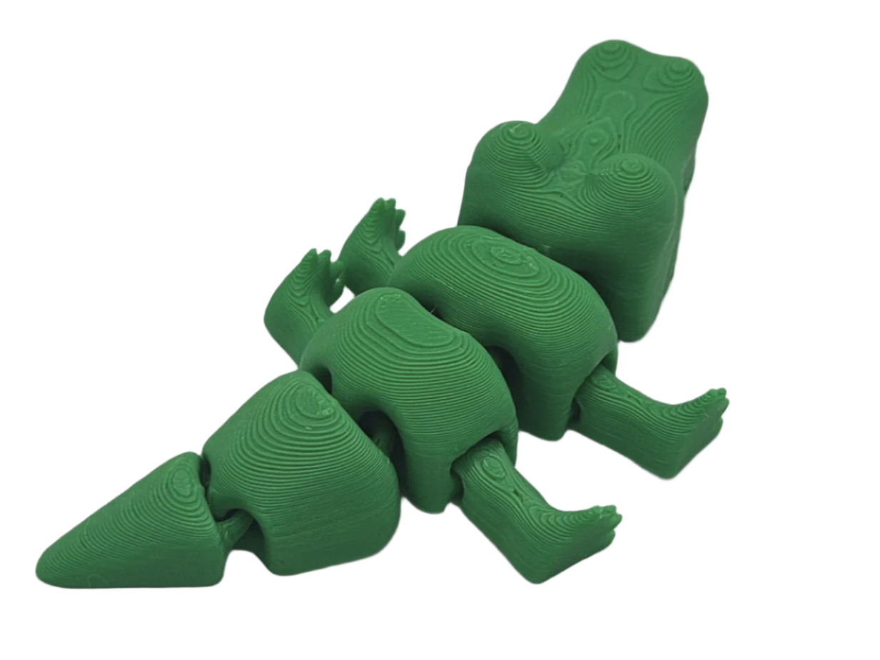 A stylized, green dinosaur sits in a black void. The dinosaur has a unique layered texture to its skin, resembling topographical lines.