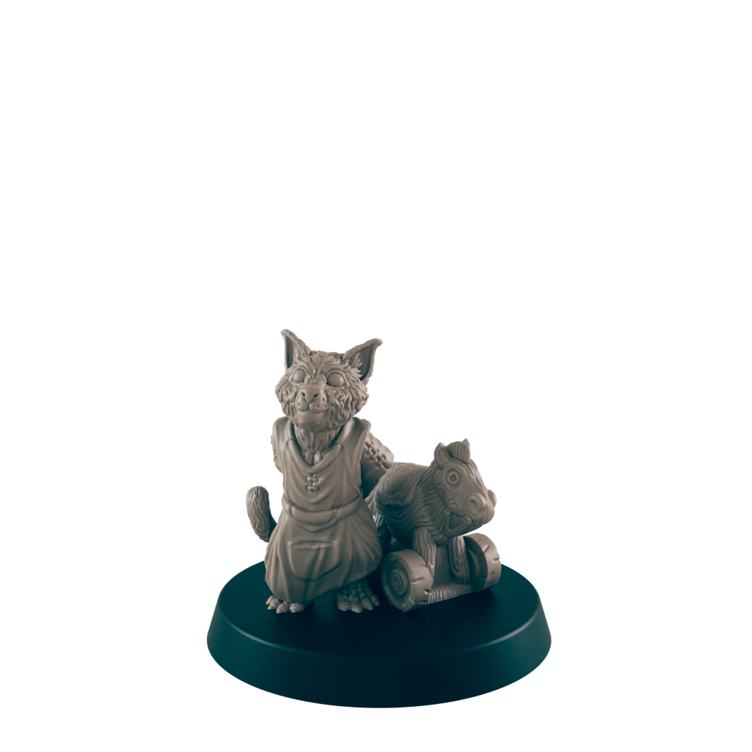 A miniature, grey cat-like creature in a tunic sits next to a toy horse on wheels atop a circular base, centered against a black background.