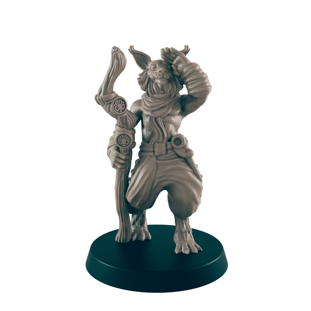 A humanoid rabbit figure salutes while holding a staff. It stands on a circular base.