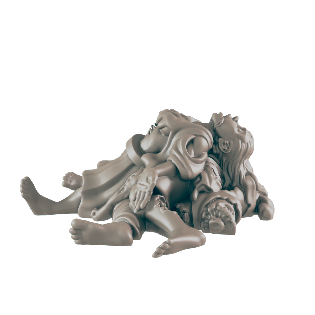 A grayish statue of multiple people is lying in a pile. The people are intertwined and their faces are angled upward.