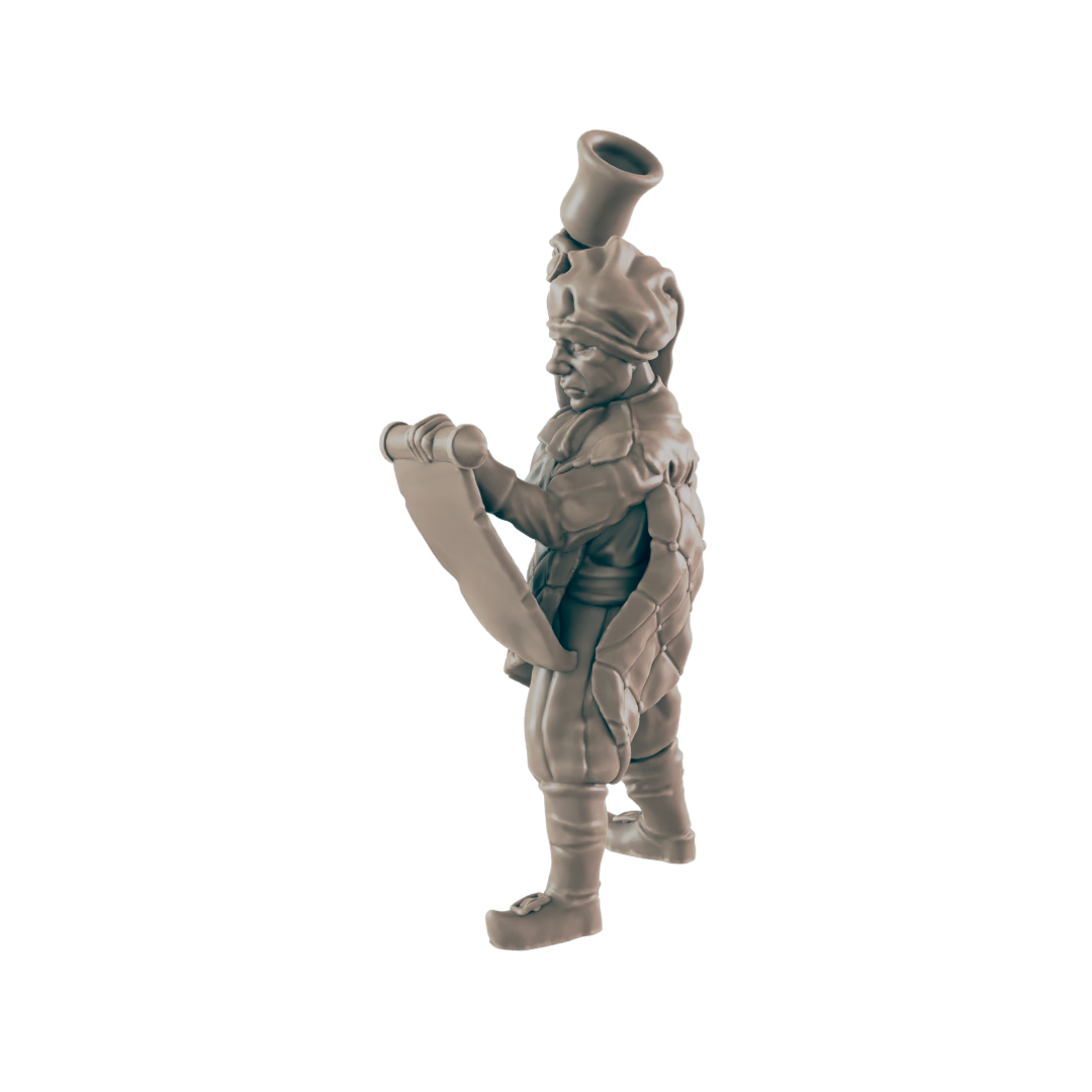 A miniature figurine of a turtle-like creature reads a scroll; it wears a hat and tunic. The figurine is presented against a black background.