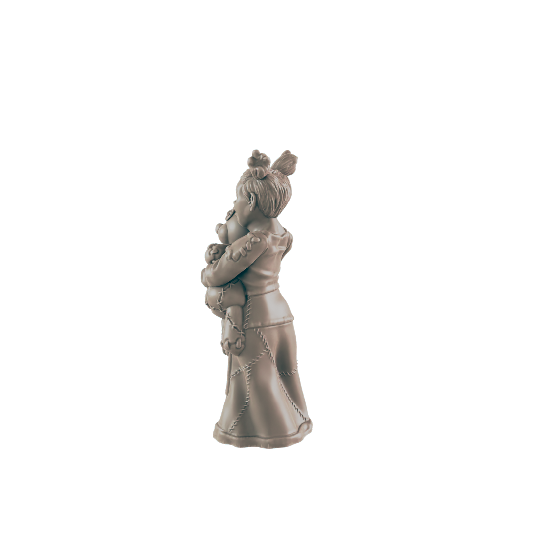 A sculpted girl hugs a teddy bear; she wears a long dress. The figurine stands alone against a black background.