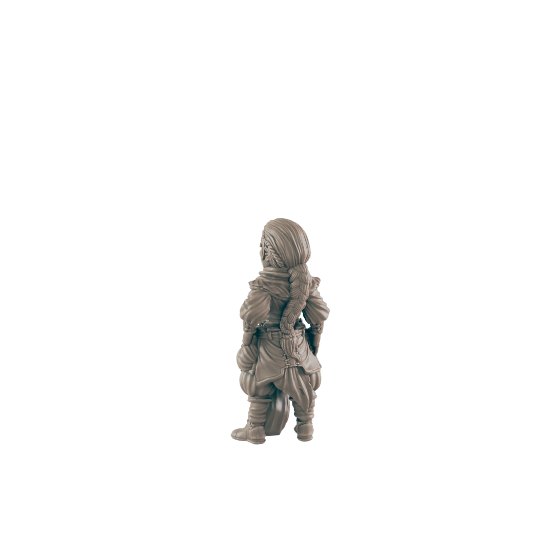 A miniature female figure, stands facing away, against a dark background.
