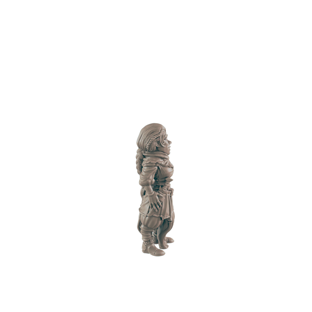 A small, female figurine stands against a black background. She appears to be wearing a robe and boots.