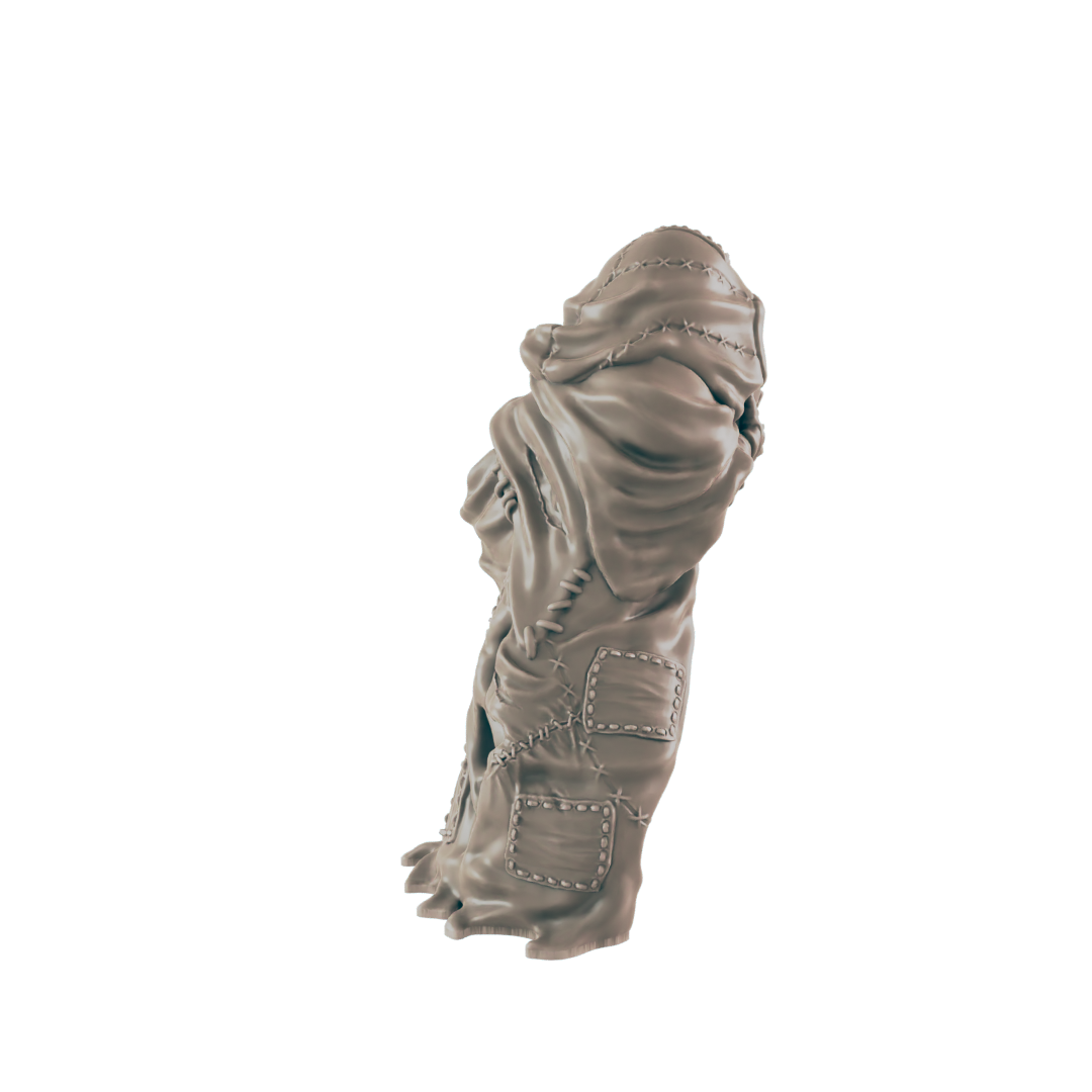 A sculpted fabric figure stands against a dark background. The fabric is sewn together with visible stitching and patches.