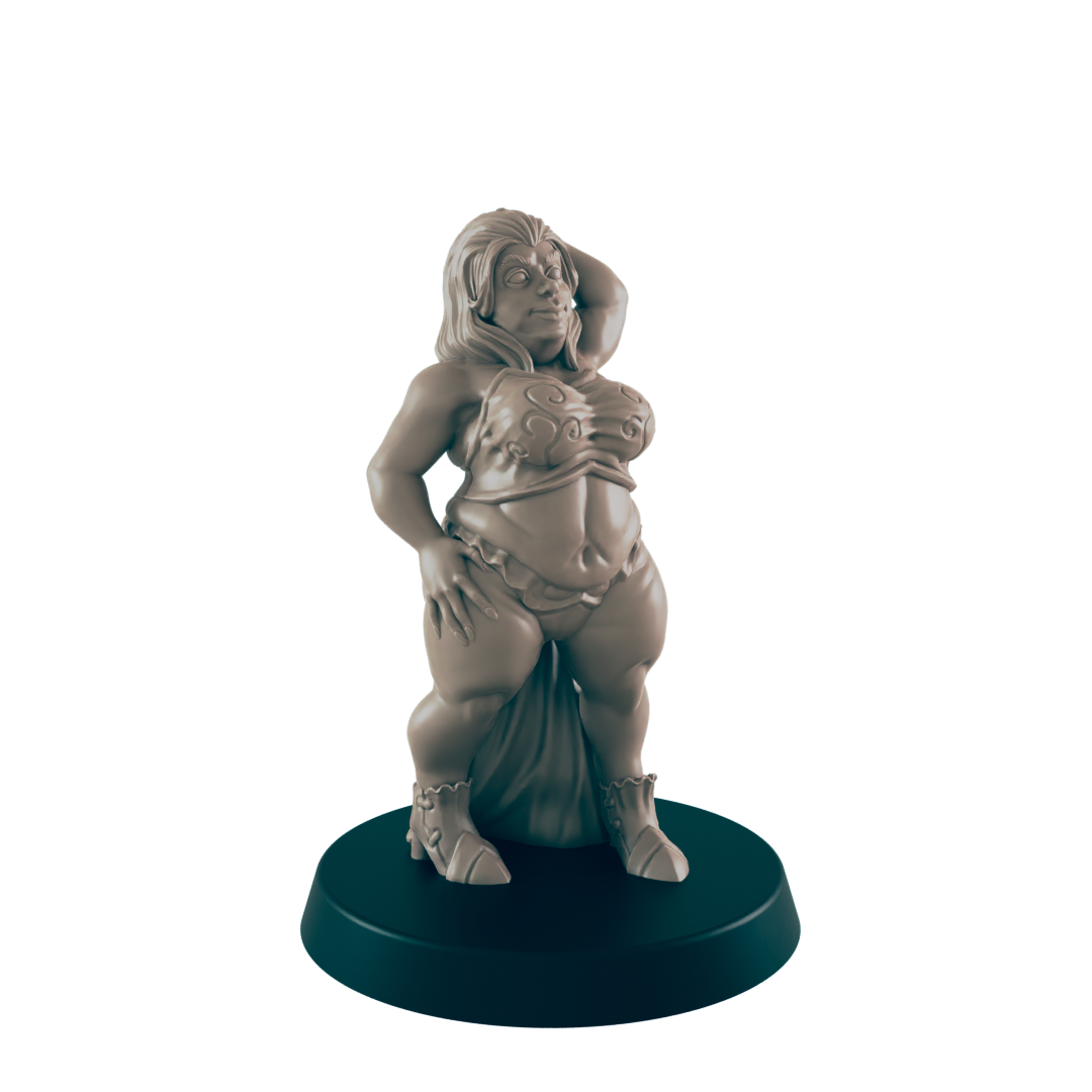 A plump female figurine stands, posing on a circular base. She wears a two-piece outfit and boots. The setting appears to be a display or tabletop.