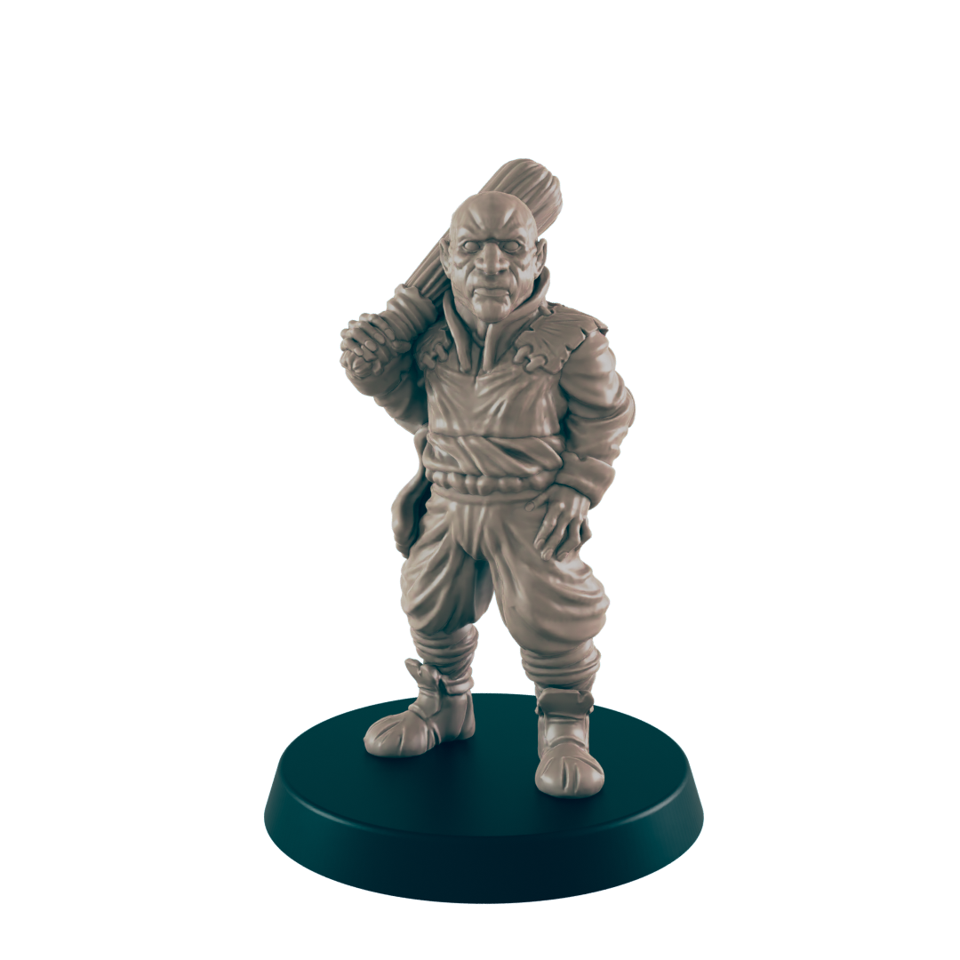 A miniature figurine of a stout man, carrying a club over his shoulder, stands on a dark circular base.