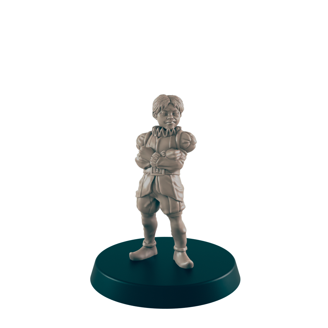 A miniature figurine stands on a circular base. The figure, a young boy in Renaissance-era clothing, stands with arms crossed. The setting is a dark, simple background.