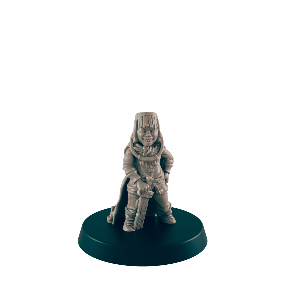 A miniature figurine of a young person, grinning and holding a sword, stands on a circular base against a black background.