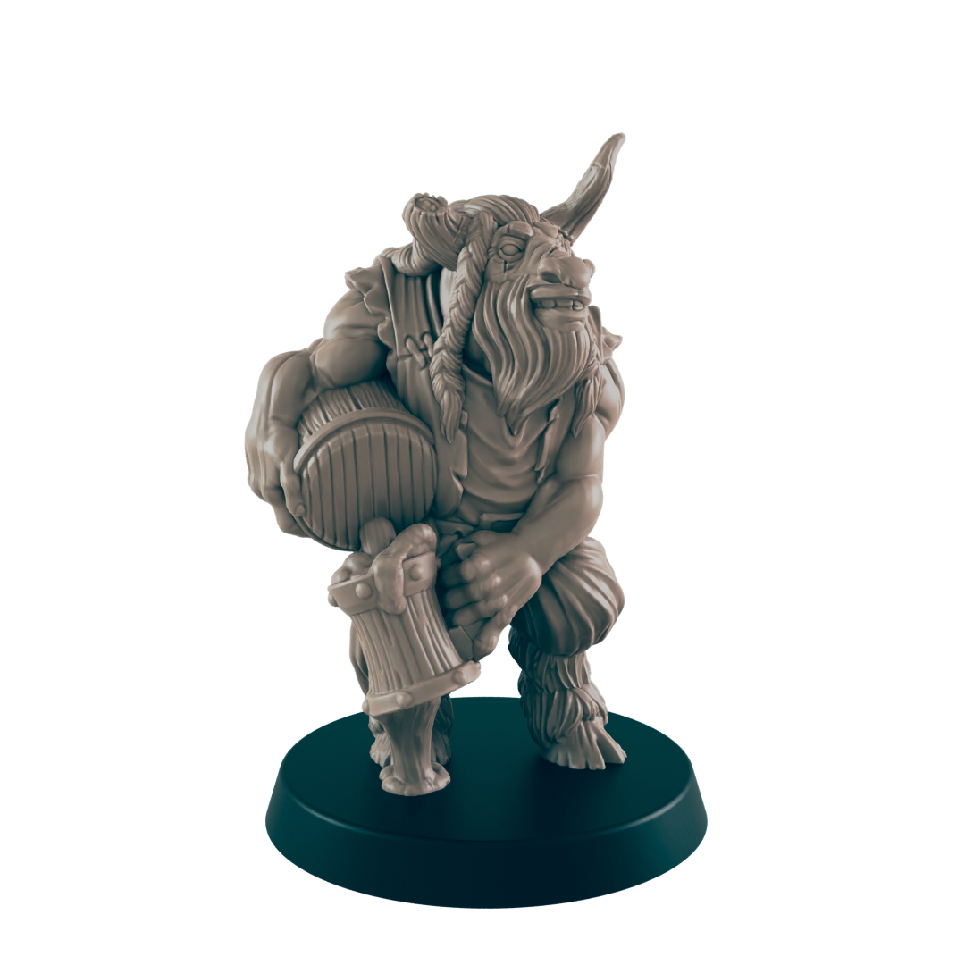 A Minotaur miniature holds a barrel and mallet; it is crouched on a circular base.