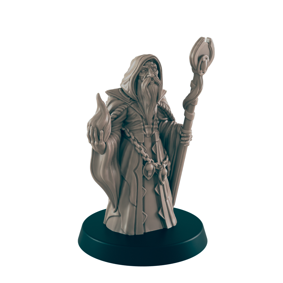 A miniature wizard figurine stands on a circular base; he holds a flame in one hand and a staff in the other. The figurine is sculpted in a hooded robe, against a dark background.