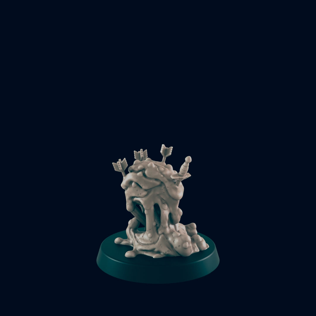 A gray, humanoid, melted blob sits on a round, blue base. Arrows and a dagger stick out from the top of its head. The background is dark blue.