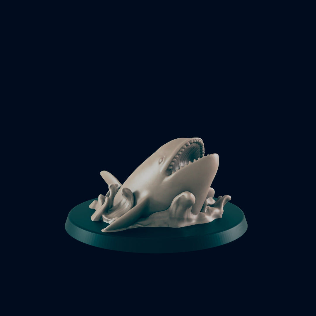 A shark miniature, mouth agape, is emerging from sculpted waves on a dark circular base.