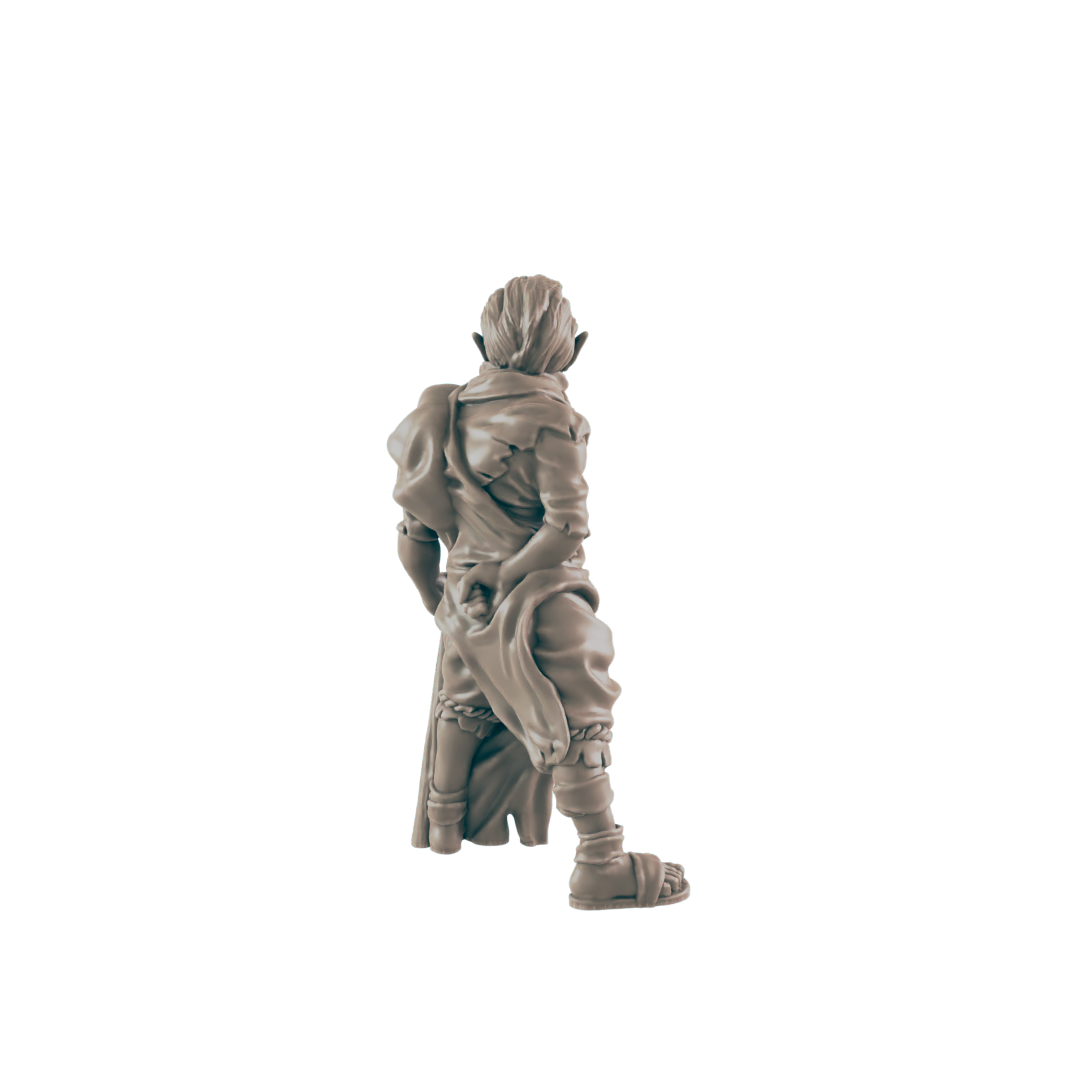 A miniature figurine of a humanoid figure, possibly an elf, stands facing away, wearing tattered clothing and sandals against a dark background.
