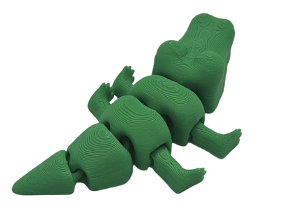 A stylized, green dinosaur sits in a black void. The dinosaur has a unique layered texture to its skin, resembling topographical lines.
