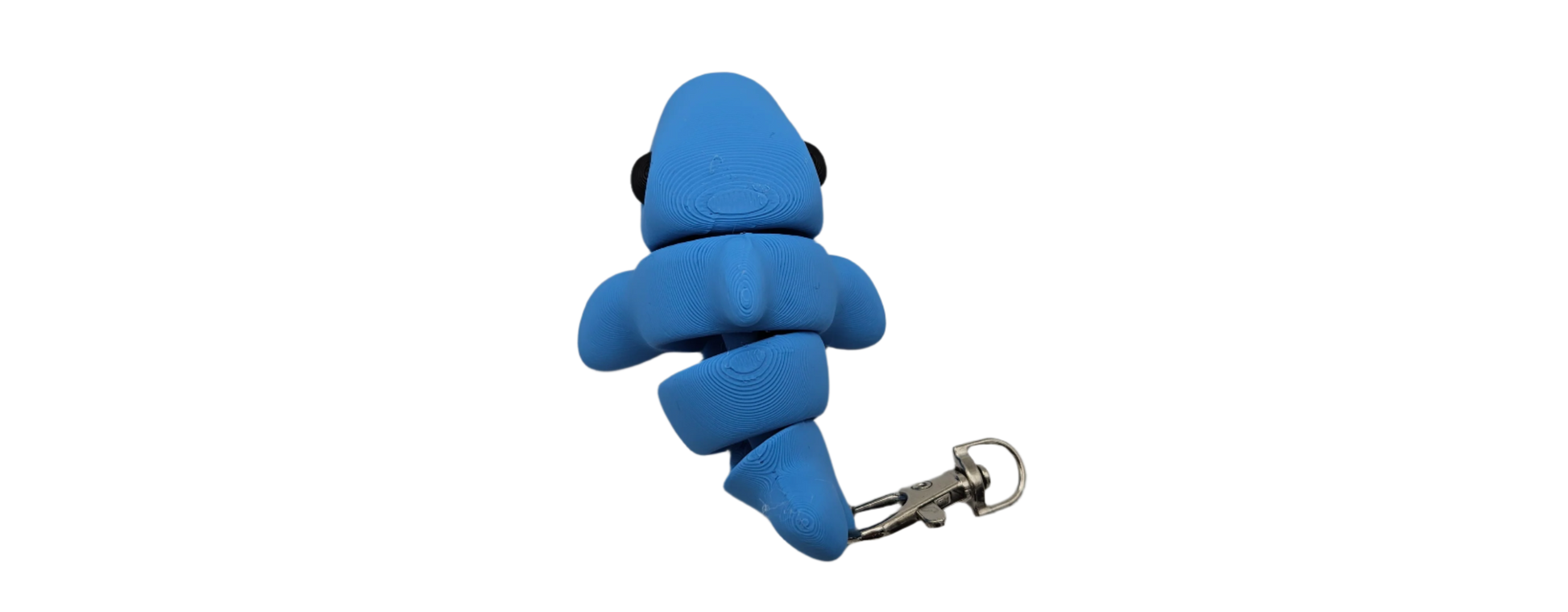 A blue robotic worm with black eyes is positioned diagonally in a black void. It features a silver, gear-like structure extending from its tail.