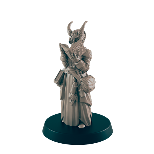 The horned tiefling miniature stands on a dark blue base, reading a book. She wears a robe, satchel, and belt with leaves, with the dark background.