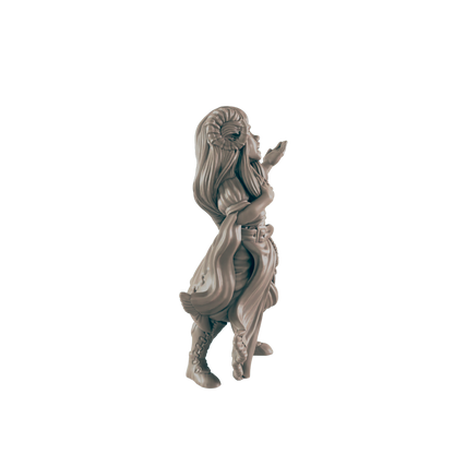 A miniature figurine of a female character, possibly an elf or similar fantasy creature, stands against a dark background.  She is blowing a kiss.