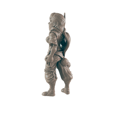 A female figurine stands, possibly a warrior, against a black background.  She wears tattered clothing and boots.