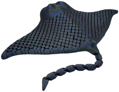 A stingray-shaped object displays a gridded texture over its body. The object has a segmented tail. It floats on a solid black background.