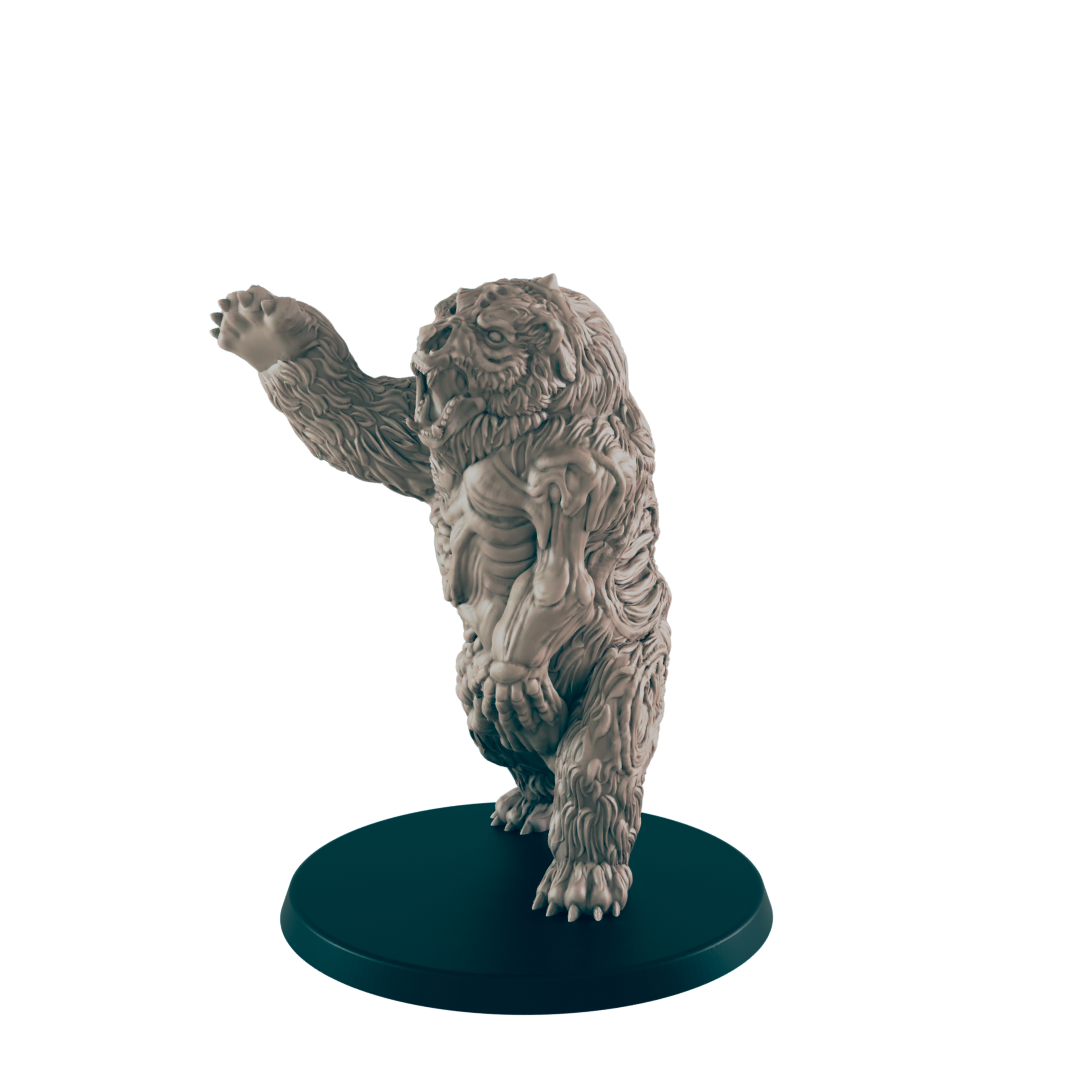 A skeletal bear miniature stands on a dark circular base, its left arm raised in a threatening posture.