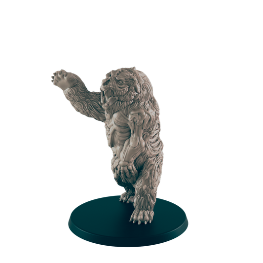 A skeletal bear miniature stands on a dark circular base, its left arm raised in a threatening posture.