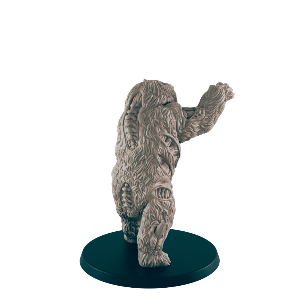 A sculpted, furry bear-like creature stands on a dark circular base; its posture suggests raising a limb.