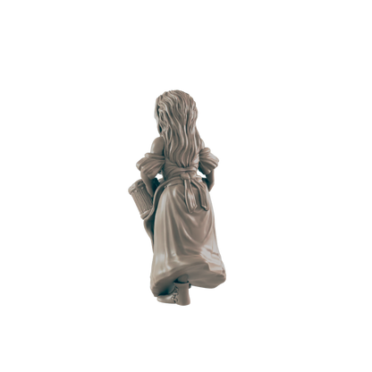 A miniature figurine of a woman, carrying a barrel, walks away from the viewer against a black background.