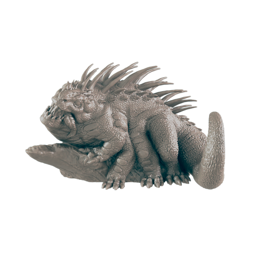 A gray, spiky, and scaly creature with six limbs rests on a small, gray rock. The creature has a short, stubby tail and thick, ridged skin.