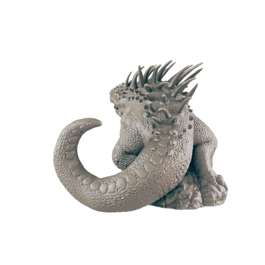 A spiky, reptilian miniature sits on a rocky base against a dark background.