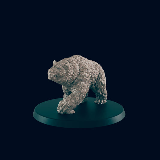 A miniature bear figure stands on a small, round, dark green base. The bear is facing left and seems to be walking against a dark blue background.