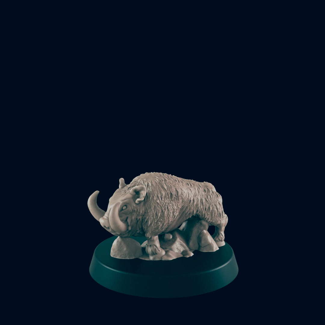 A grey boar miniature stands on a small grey rocky base on a larger, dark green platform, all against a dark blue background.
