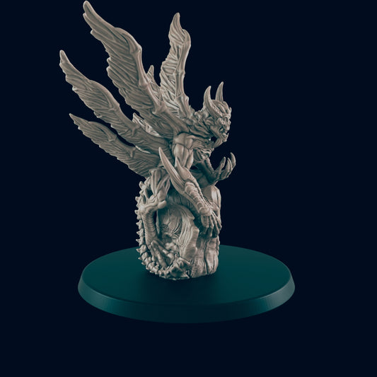 A winged, horned demon statue sits atop a detailed rocky base, posed with outstretched claws, all on a dark blue circular platform against a plain blue background.