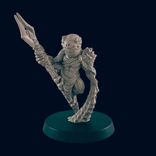 A lizard-like humanoid figure stands, holding a large, unusual weapon and wearing partial armor, on a circular base against a dark blue background.