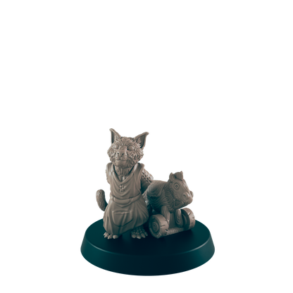 A miniature, grey cat-like creature in a tunic sits next to a toy horse on wheels atop a circular base, centered against a black background.