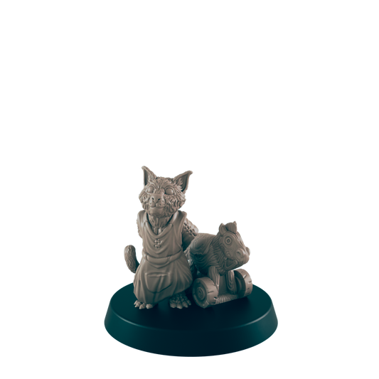 A miniature, grey cat-like creature in a tunic sits next to a toy horse on wheels atop a circular base, centered against a black background.