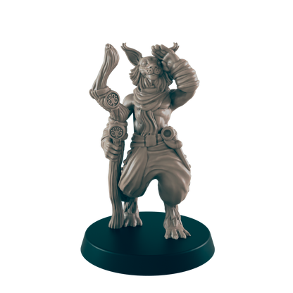 A humanoid rabbit figure salutes while holding a staff. It stands on a circular base.
