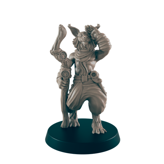 A humanoid rabbit figure salutes while holding a staff. It stands on a circular base.