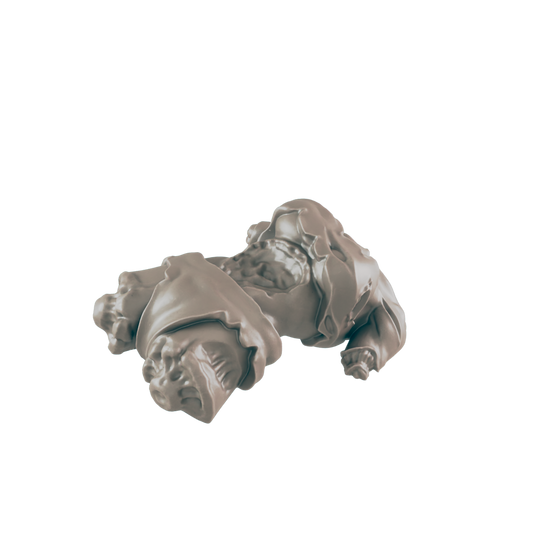 A clay-colored, grotesque, two-headed figure, appears to be lying in an undeterminate position, on a black background.