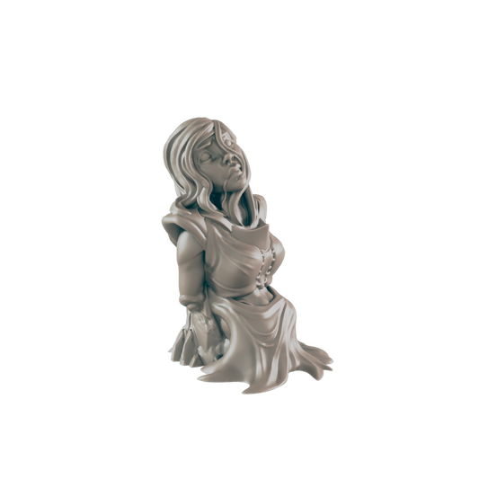 A monochromatic figurine of a kneeling, blindfolded woman with shoulder armor and flowing fabric looks upwards against a stark, black backdrop.