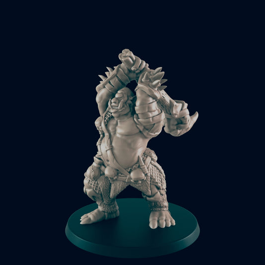 A miniature orc figure wields a large weapon, standing on a dark circular base against a black background.