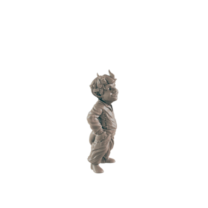 A small, horned imp figurine stands, hands in pockets, against a black background.