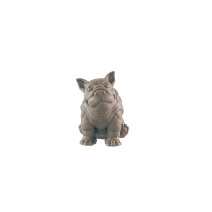 A French Bulldog figurine sits on a dark background.