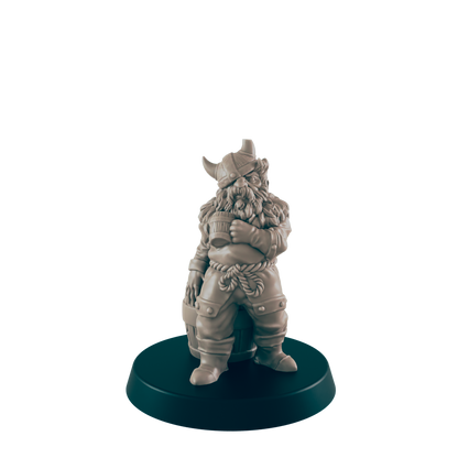 A miniature dwarf figure, standing beside a barrel, rests on a circular base.  The dwarf is clad in Viking-style attire, holding a tankard.