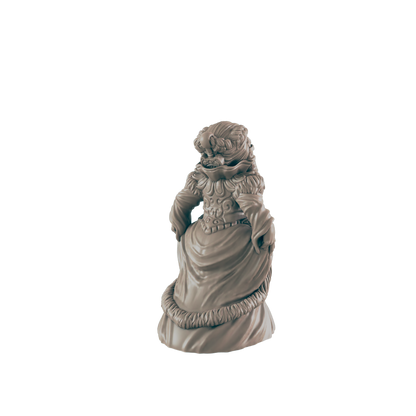 A lion-like figurine, dressed in an ornate gown, stands against a dark background.