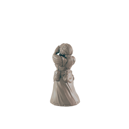 A miniature female figure, seemingly shielding her eyes, stands against a dark background.
