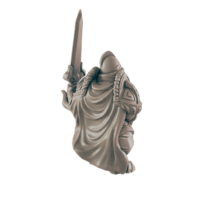 A figurine stands, raising a sword overhead. The figure wears ornate armor and a cloak. The figurine is on a black background.