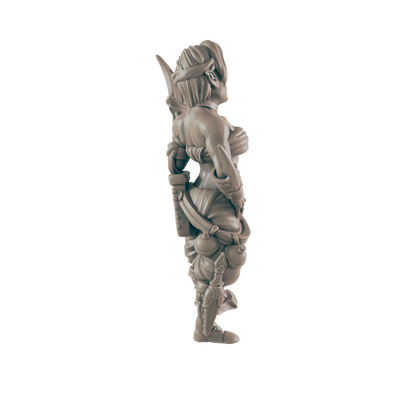 A female figurine stands, facing right, against a dark background.  She wears armor and carries a weapon.