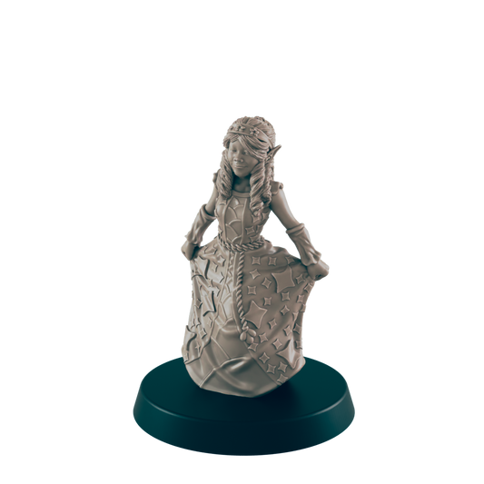A miniature elf girl in a star-covered dress poses on a dark green base. The figure is unpainted and gray against a solid black background.