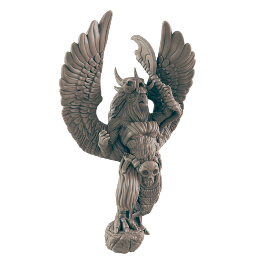 A winged, grey humanoid figure with a skull on its head holds a bladed weapon overhead. It stands atop a rocky base in a dark environment.